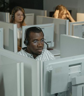 Man with headset providing customer support
