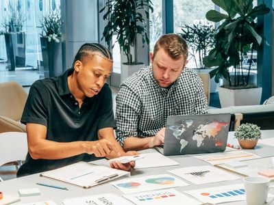 Pension fund management team analyzing data